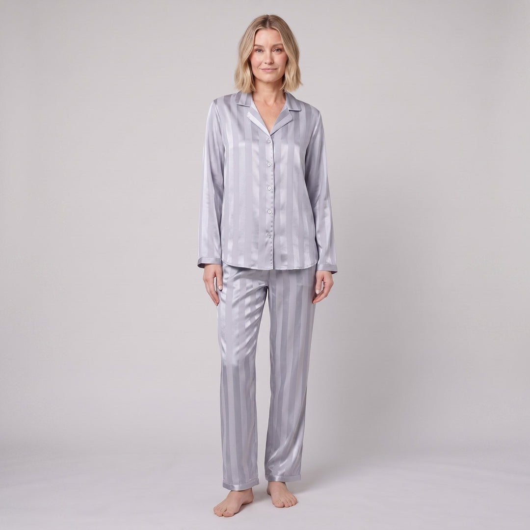 Luxe satin pyjama set in silver blue, front view on model