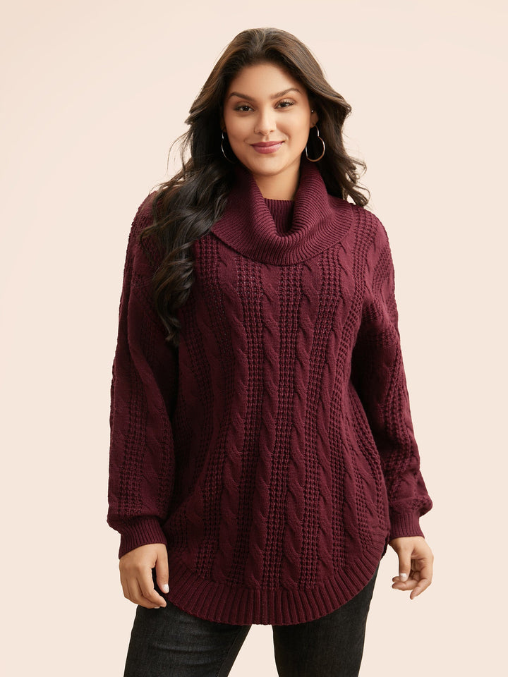 Cozy Tula pullover featuring a stylish cable knit design, turtleneck, and relaxed fit, perfect for layering in cooler weather. - 1