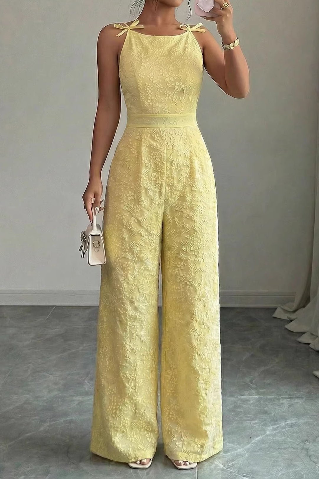Fiora Jumpsuit Women | Textured, Elegant Sleeveless with Bow Detail 1