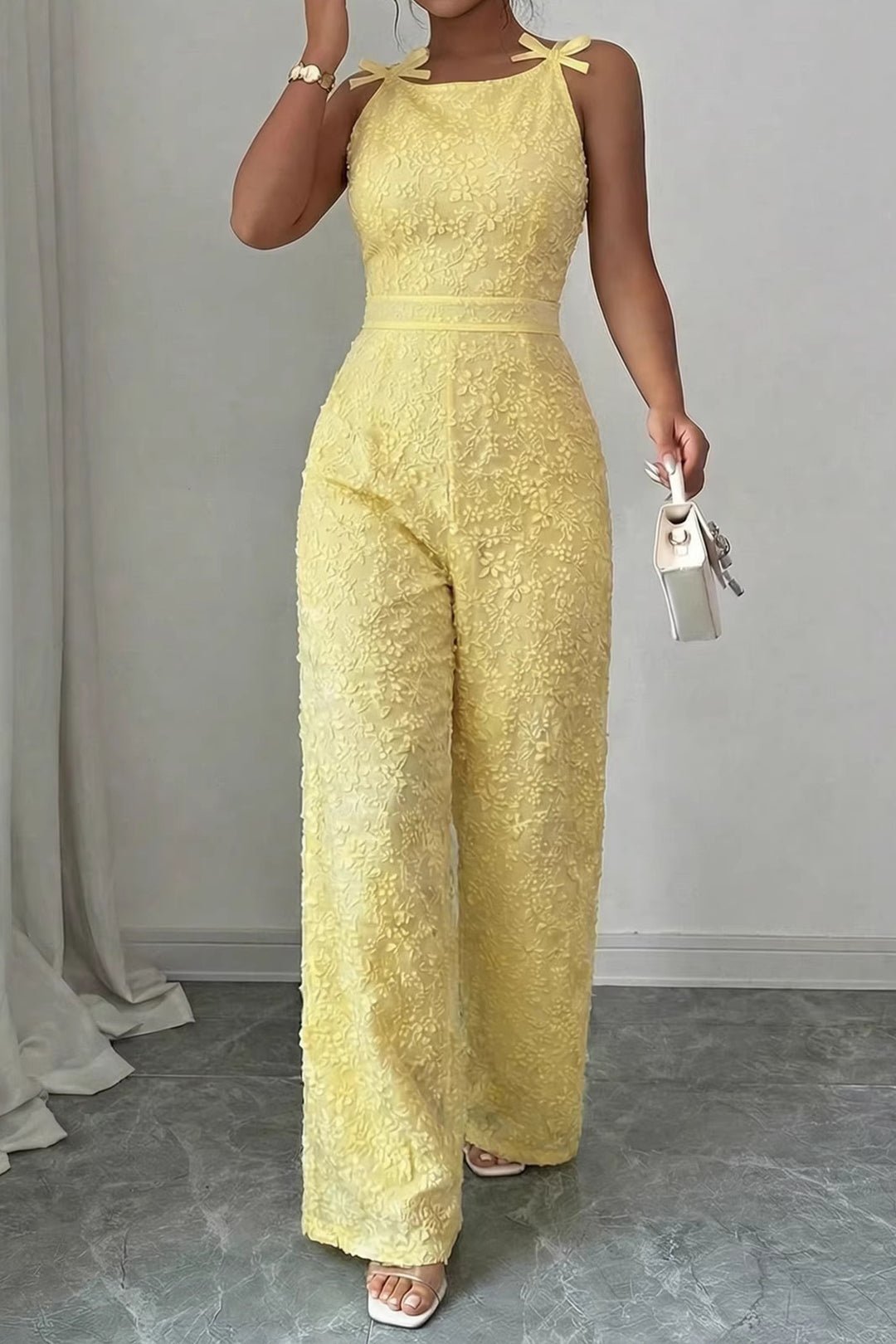 Fiora Jumpsuit Women | Textured, Elegant Sleeveless with Bow Detail 2