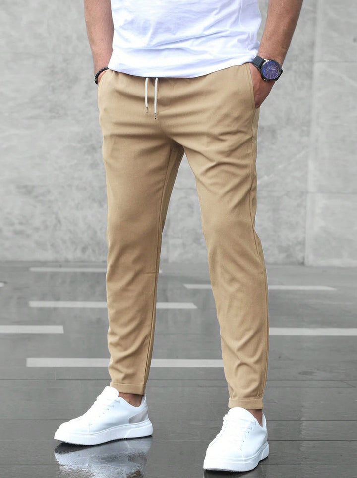 Brixon Men's Casual Trousers featuring a premium lightweight fabric, designed with a straight-leg fit for comfort and style. - 2