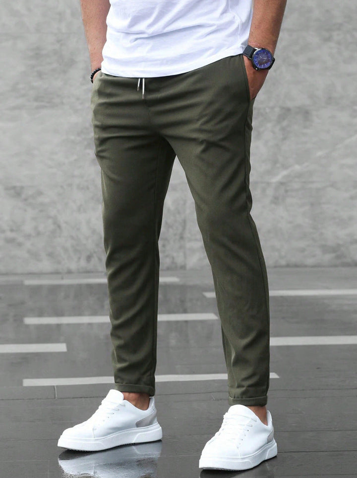 Brixon Men's Casual Trousers featuring a premium lightweight fabric, designed with a straight-leg fit for comfort and style. - 1