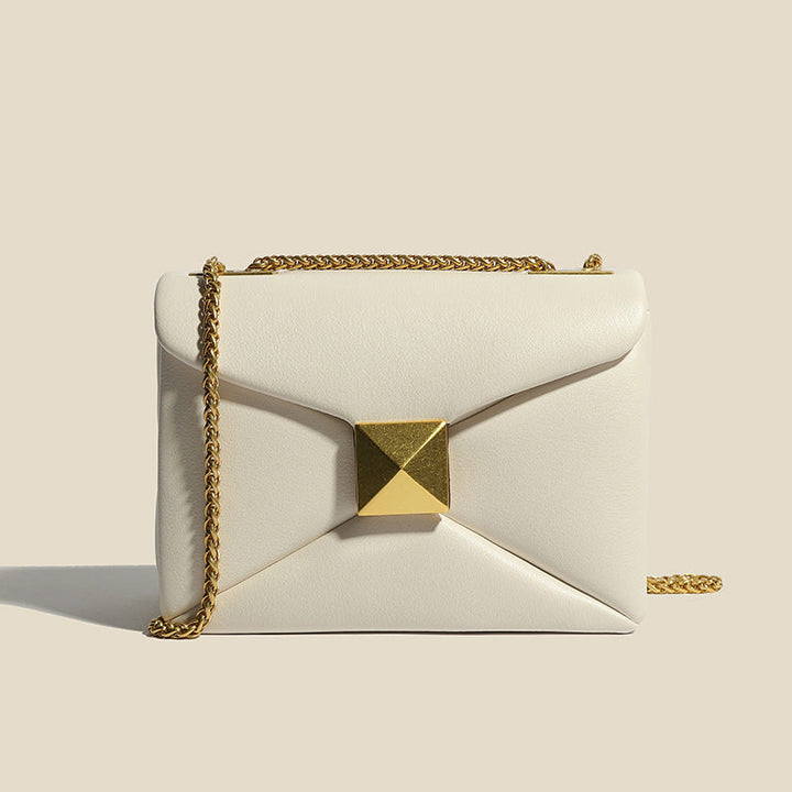 Stylish Glamco Chain Bag featuring a premium leather-look design adorned with elegant gold rivets, perfect for adding a touch of sophistication to any outfit. - 1