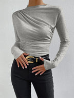 Ravishing black long sleeve shirt made from high stretch jersey fabric featuring stylish ruching detail for a flattering fit. - 1