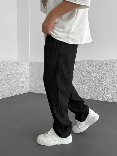 Rive | RIBBED RELAXED FIT TROUSERS