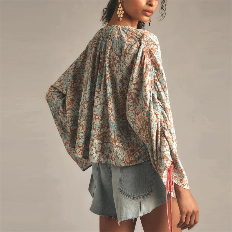 Arianna Floral Blouse featuring a puff sleeve design, made from a soft organic cotton blend, perfect for stylish and eco-friendly fashion. - 3