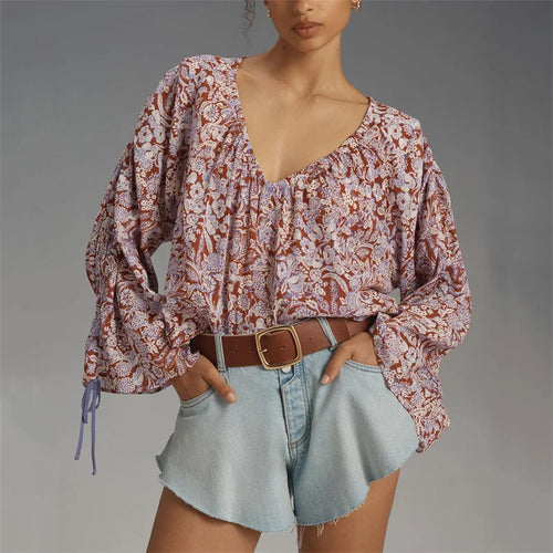 Arianna Floral Blouse featuring a puff sleeve design, made from a soft organic cotton blend, perfect for stylish and eco-friendly fashion. - 2