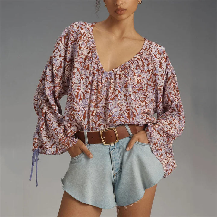 Arianna Floral Blouse featuring a puff sleeve design, made from a soft organic cotton blend, perfect for stylish and eco-friendly fashion. - 2