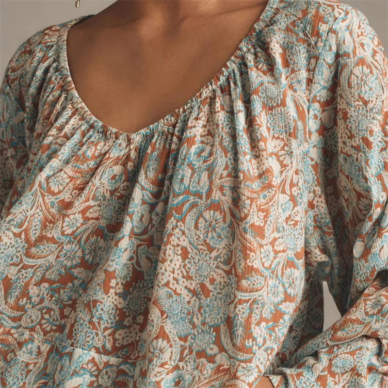 Arianna Floral Blouse featuring a puff sleeve design, made from a soft organic cotton blend, perfect for stylish and eco-friendly fashion. - 7