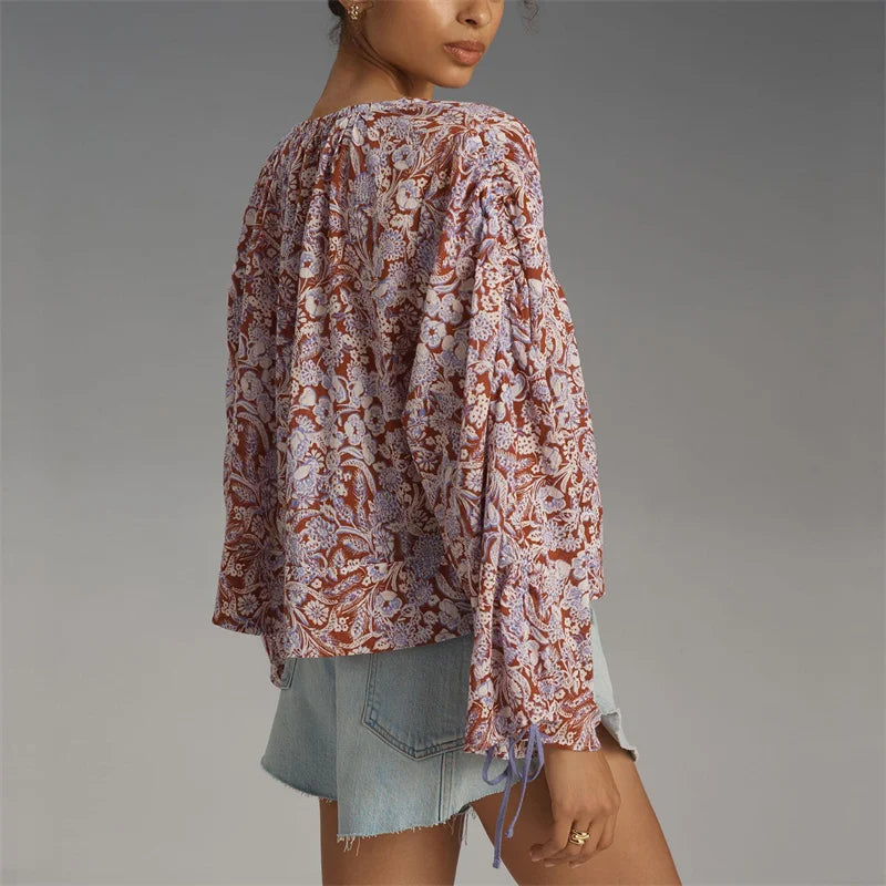Arianna Floral Blouse featuring a puff sleeve design, made from a soft organic cotton blend, perfect for stylish and eco-friendly fashion. - 5