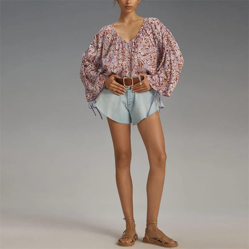 Arianna Floral Blouse featuring a puff sleeve design, made from a soft organic cotton blend, perfect for stylish and eco-friendly fashion. - 6