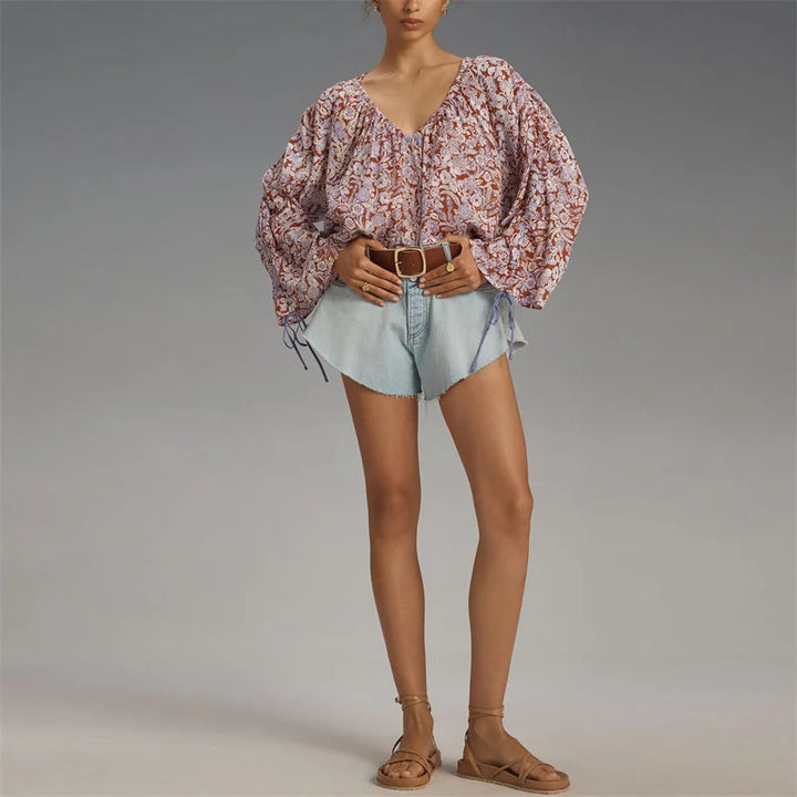 Arianna Floral Blouse featuring a puff sleeve design, made from a soft organic cotton blend, perfect for stylish and eco-friendly fashion. - 6