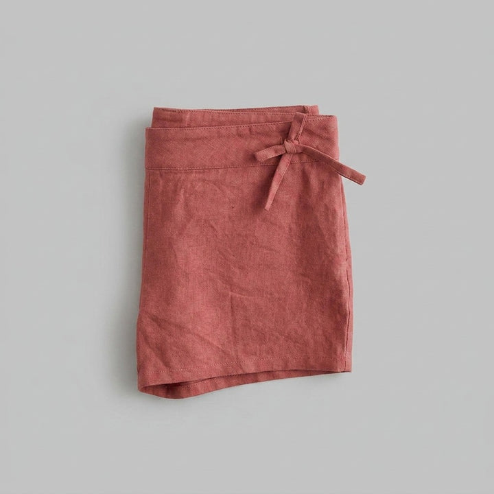 Blythe Linen Shorts Tuscan Red folded flat lay