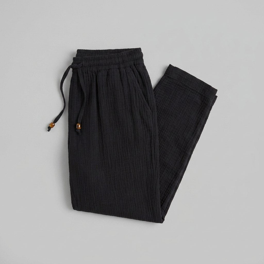 Dara black tapered pants product flat lay