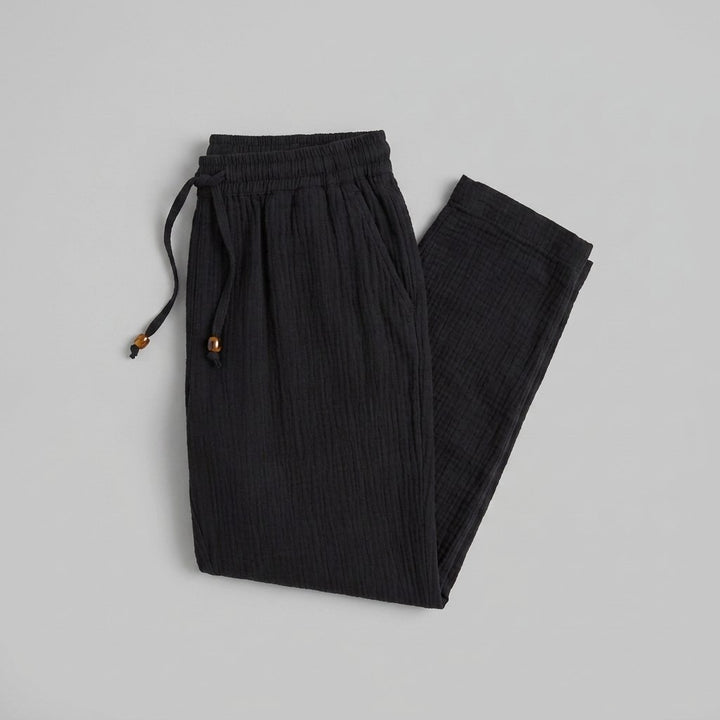 Dara black tapered pants product flat lay