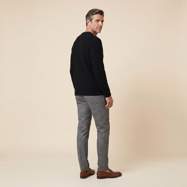 Kenton men's waffle-knit sweater black side back on model