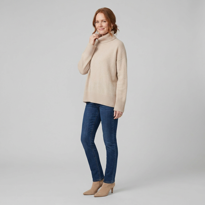Liora cashmere turtleneck beige three-quarter pose on model