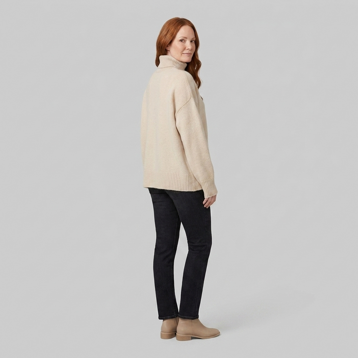 Liora cashmere turtleneck beige side back on model