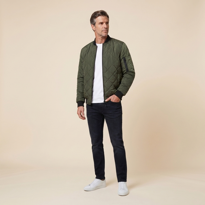 Grayson quilted bomber army green three-quarter pose on model