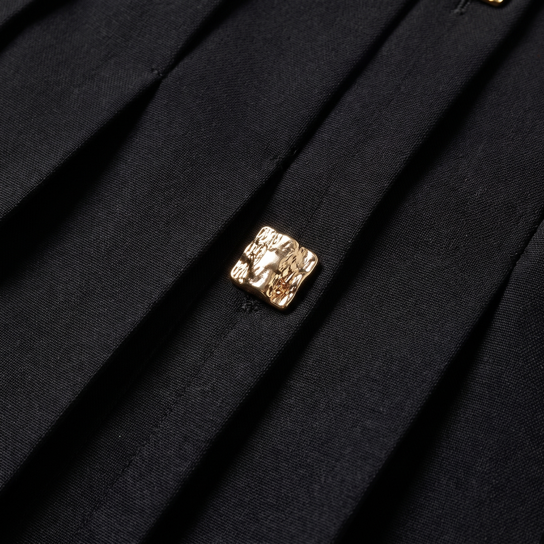 Luna black pleated fabric gold button detail