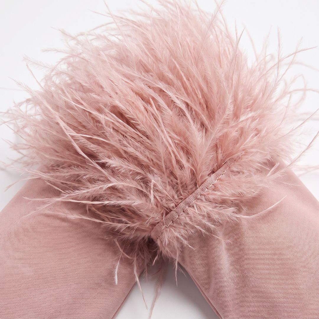 Notte Viva feather cuff detail