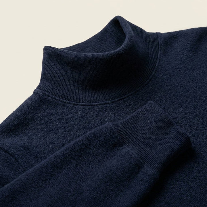 Maverick navy brushed-cotton mock-neck fabric close-up