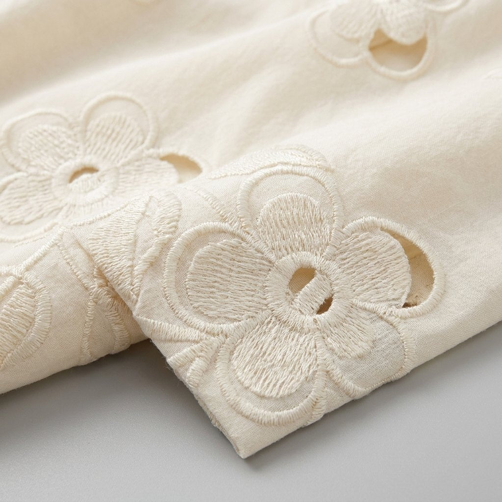 Mira ivory floral cutwork appliqué fabric detail