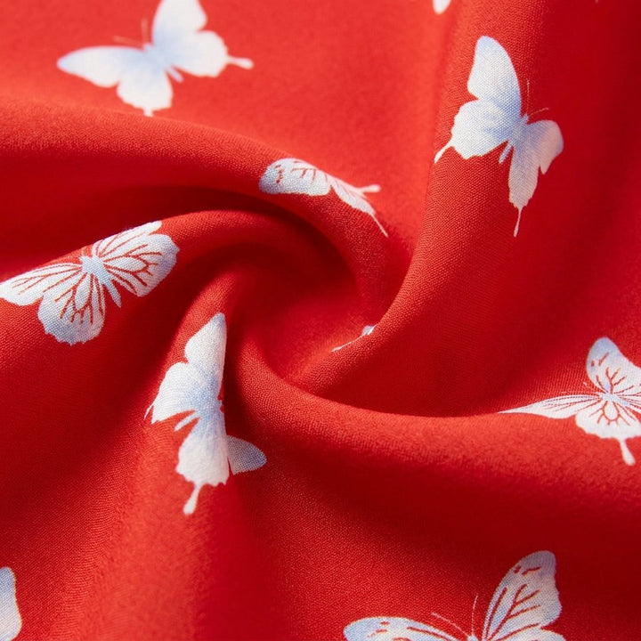 Rivella dress fabric detail, red with white butterfly print