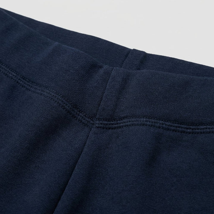 Sora navy yoga pants soft-stretch fabric close-up