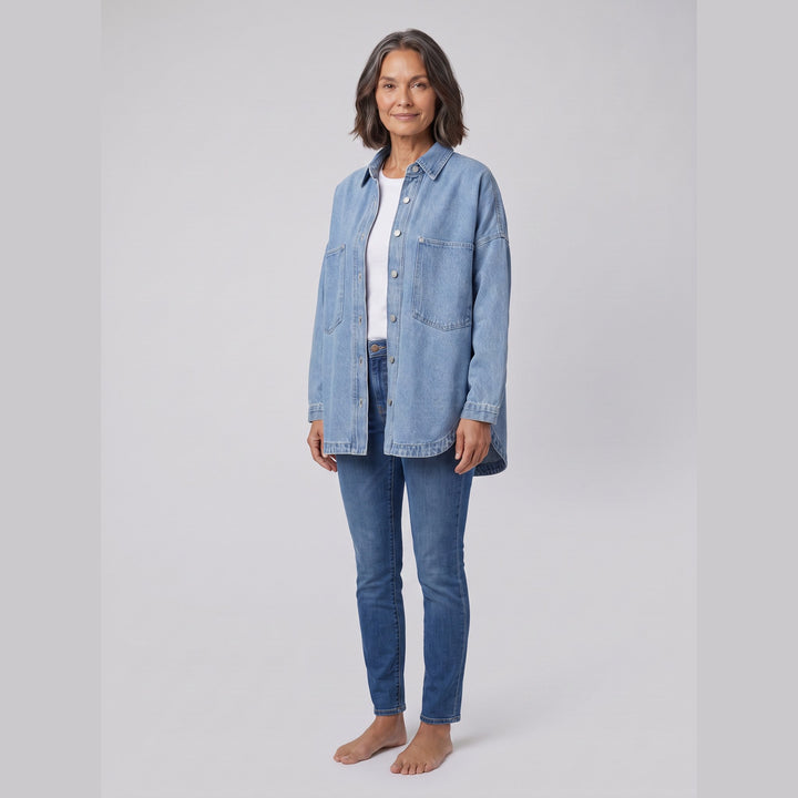 Addison oversized denim overshirt in medium blue on model