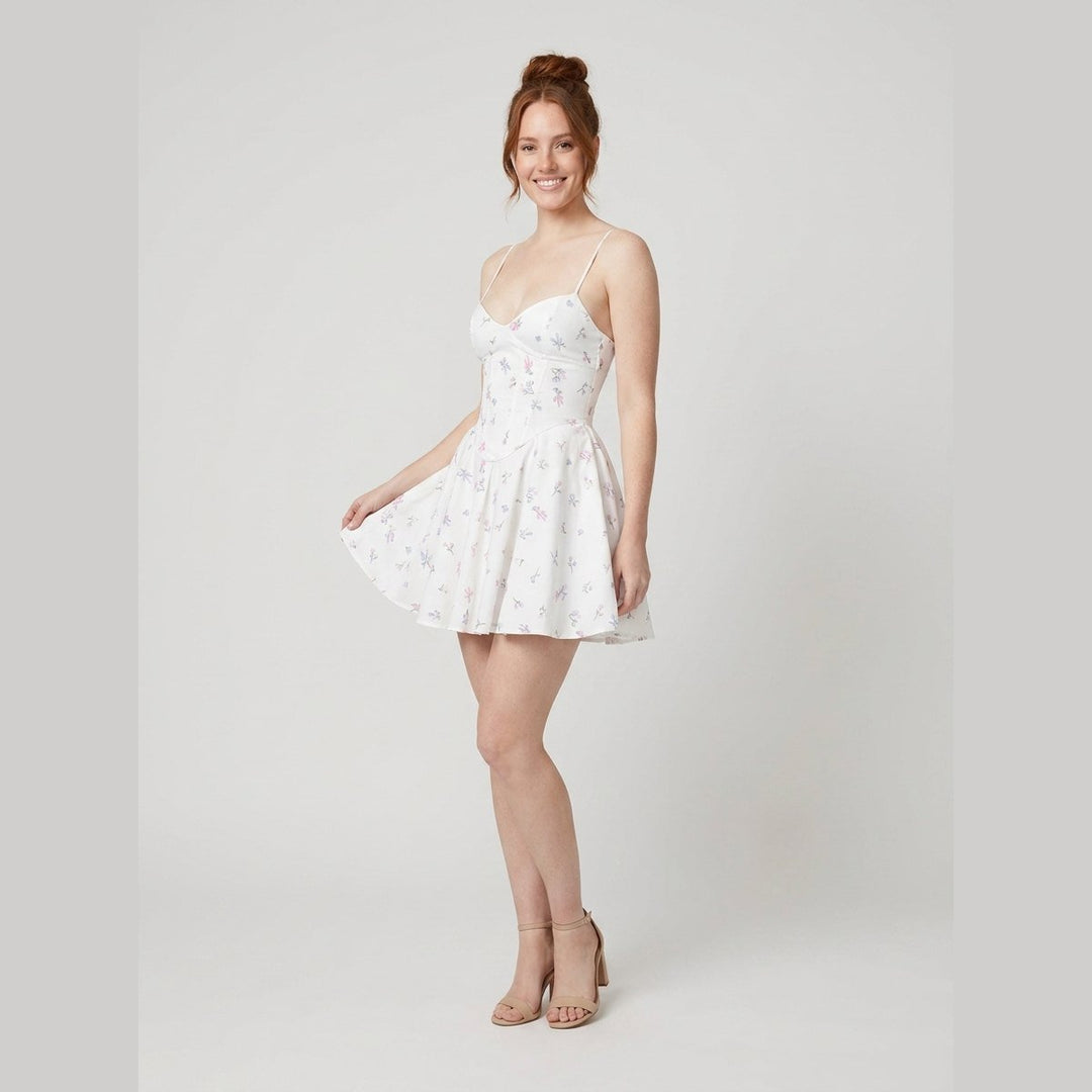 Adrienne floral mini dress side on model