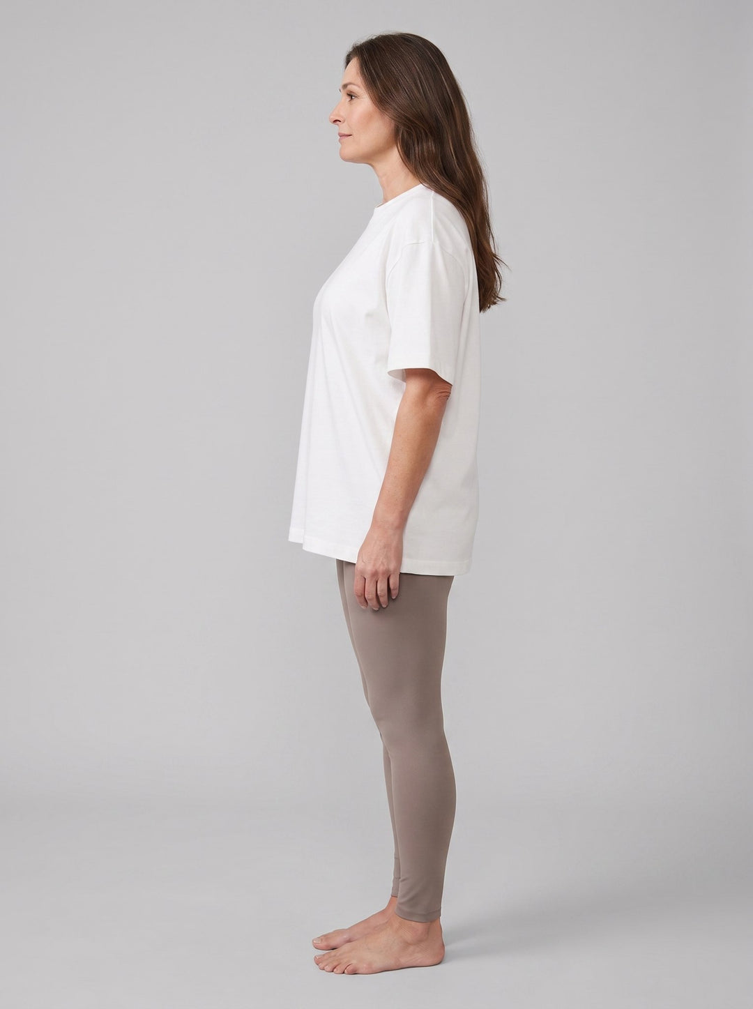 Alera oversized white t-shirt side view on model