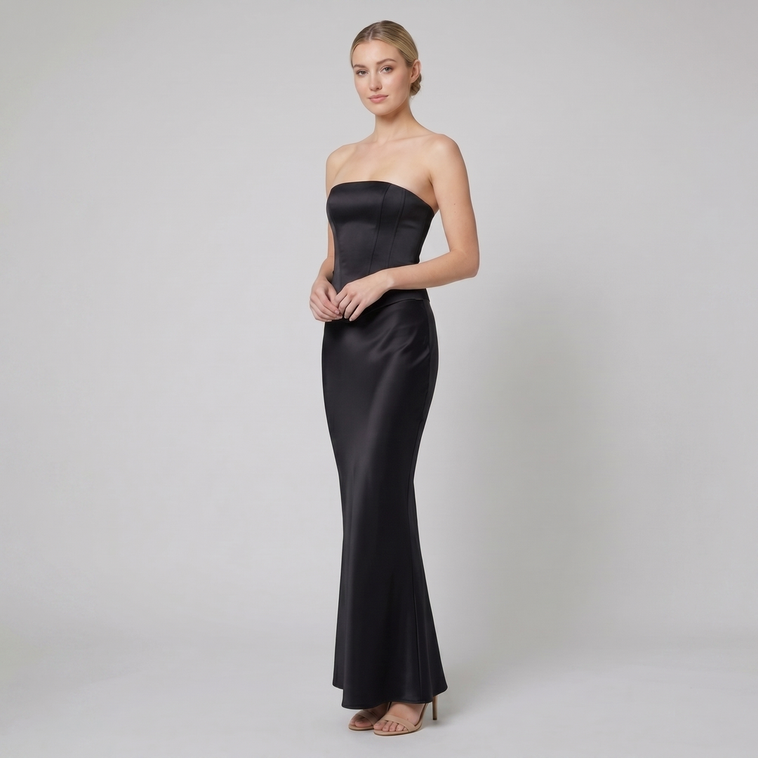 Alva black bias-cut satin maxi skirt on model