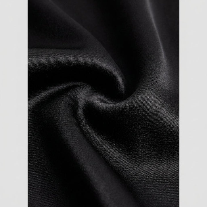 Alva black satin fabric close-up