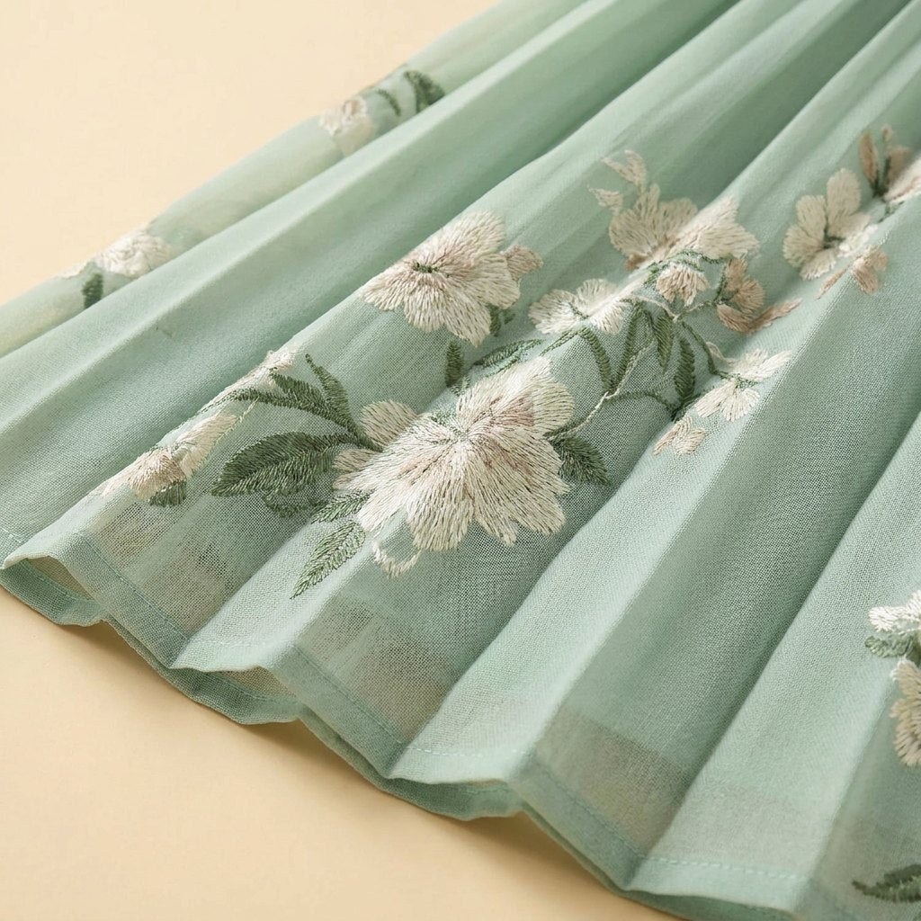 Amandine sage green floral midi dress fabric detail