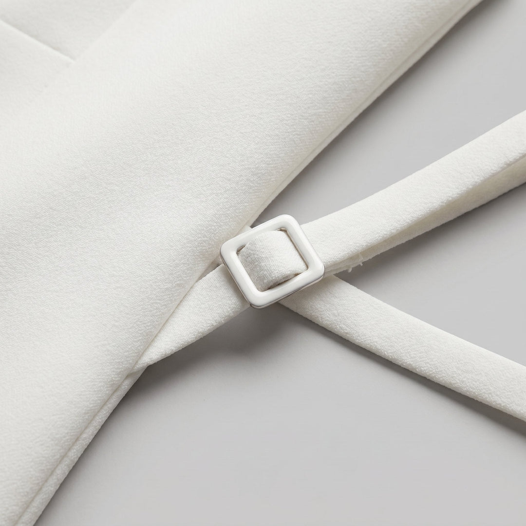 Annelise dress fabric and belt buckle close-up