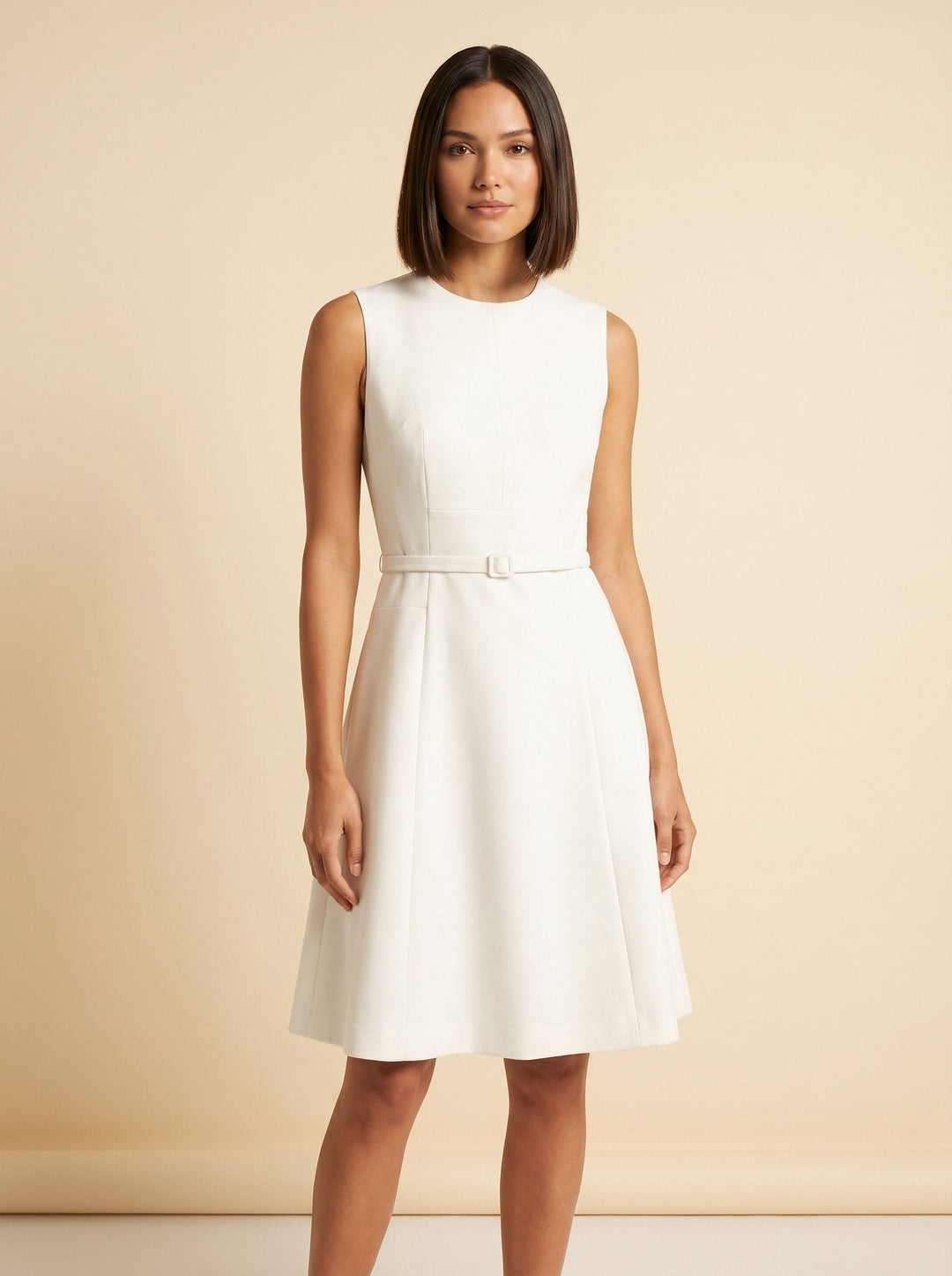 Annelise belted fit-and-flare dress in white, front view on model