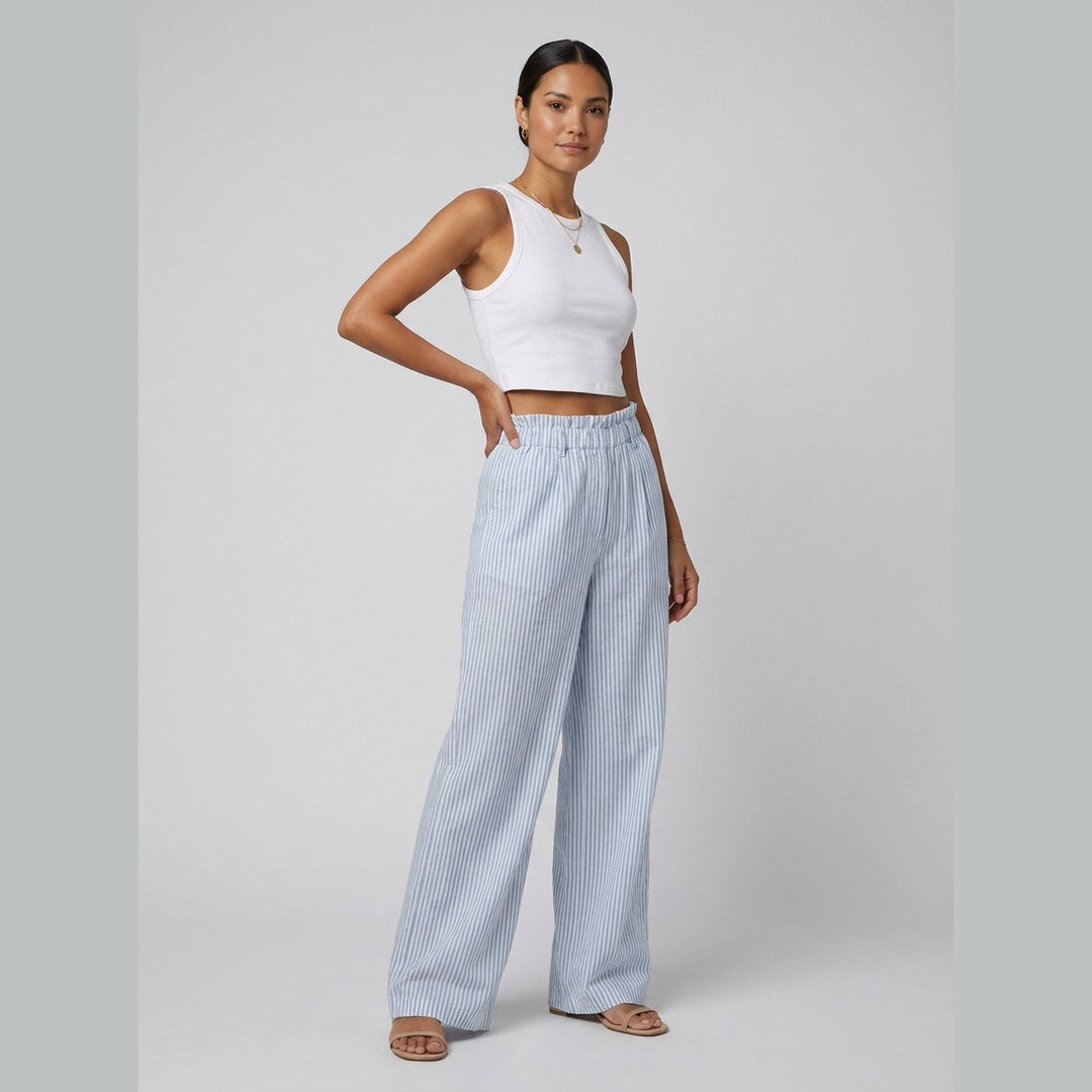 White tank top and blue striped pants set, three-quarter view on model