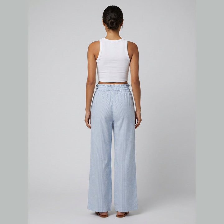 White tank and striped pants set, back view on model