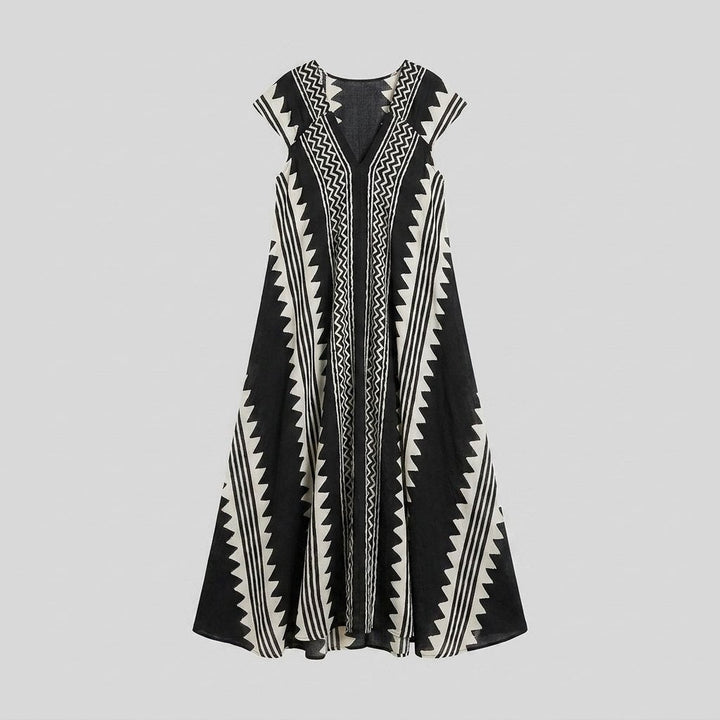 Anouck printed maxi dress with V neckline and short sleeves, flat lay
