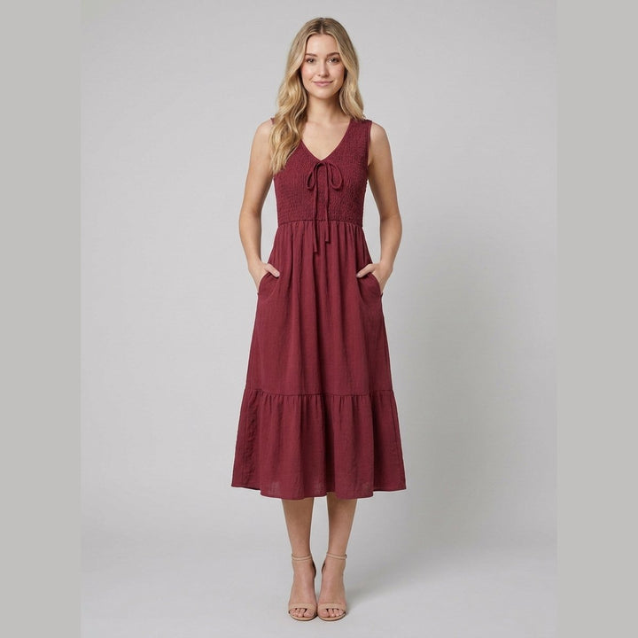 Burgundy A-line midi dress with a V-neck, front view on model
