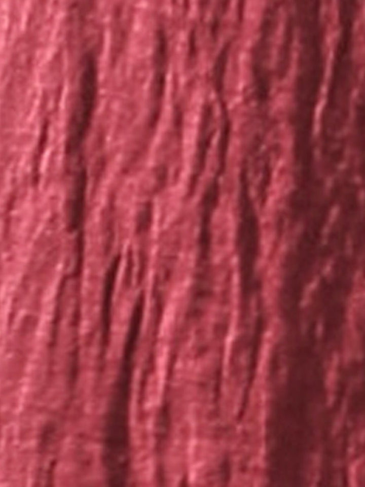 Close-up of the flowy crinkled polyester fabric
