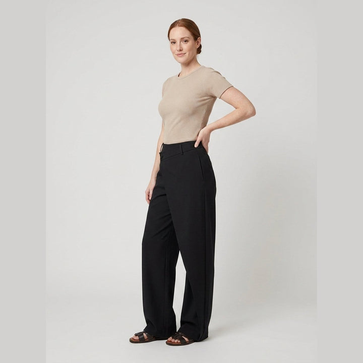 Black wide-leg dress pants, side view on model