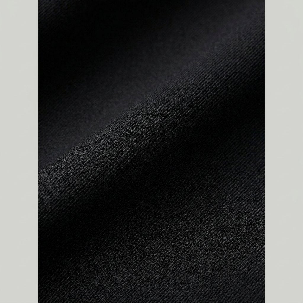 Close-up of the polyester-rayon fabric and button waist
