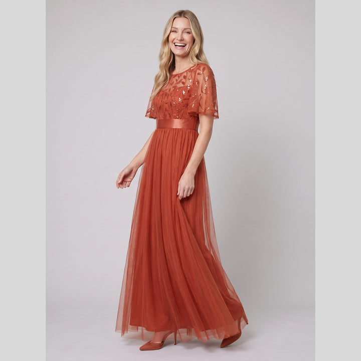 Burnt orange sequin leaf tulle maxi dress with flutter sleeves - The store Vancouver