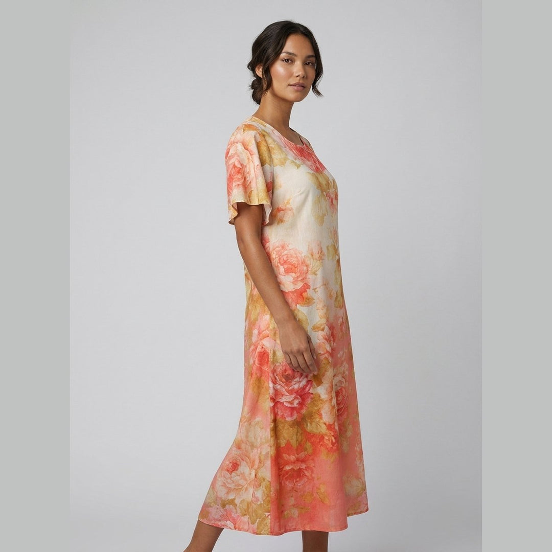 Bella floral midi dress on model side pose