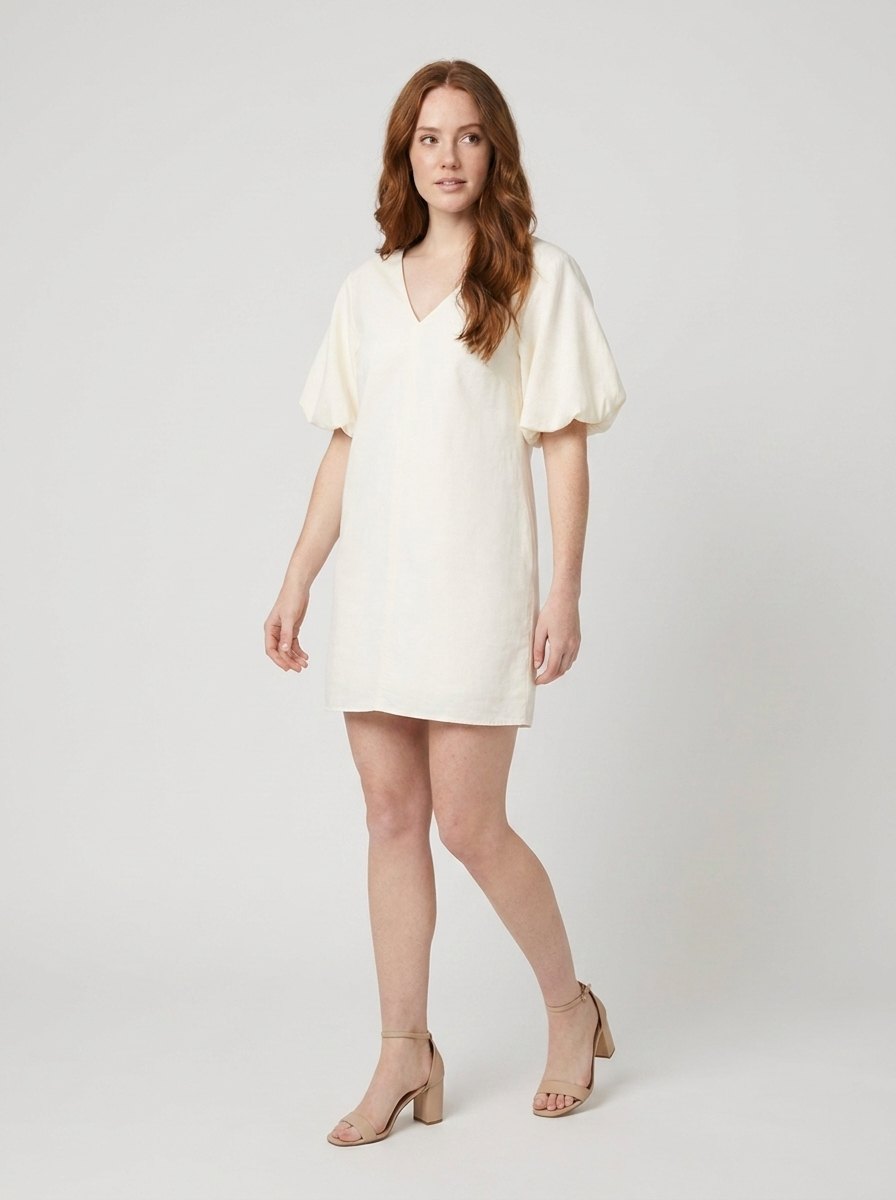 Blythe cream mini dress side pose