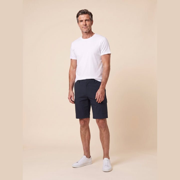 Navy cargo Bran Bermuda shorts on model, relaxed pose