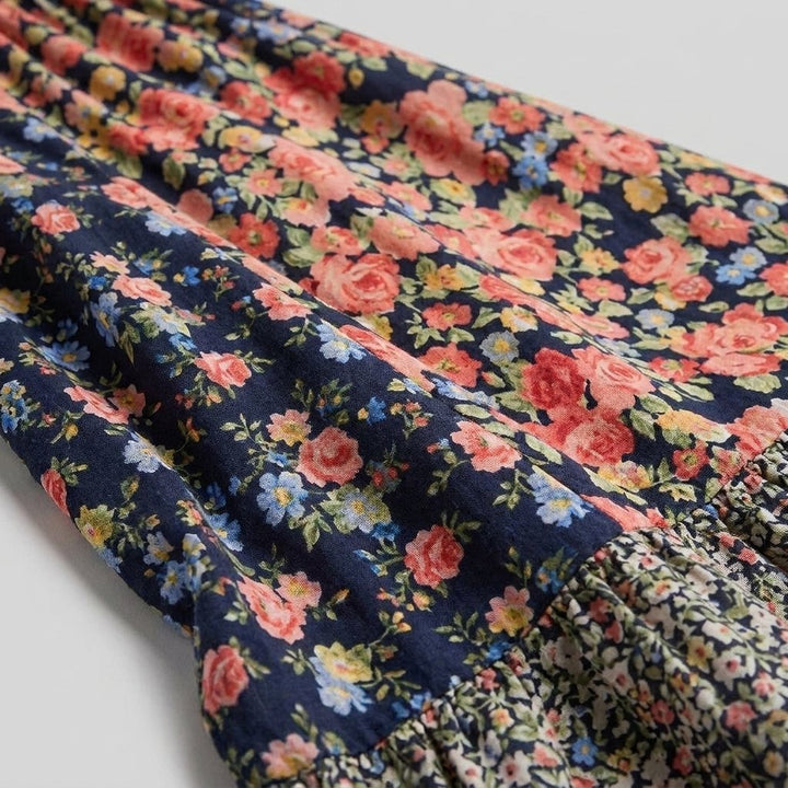 Breezy floral midi dress fabric close-up