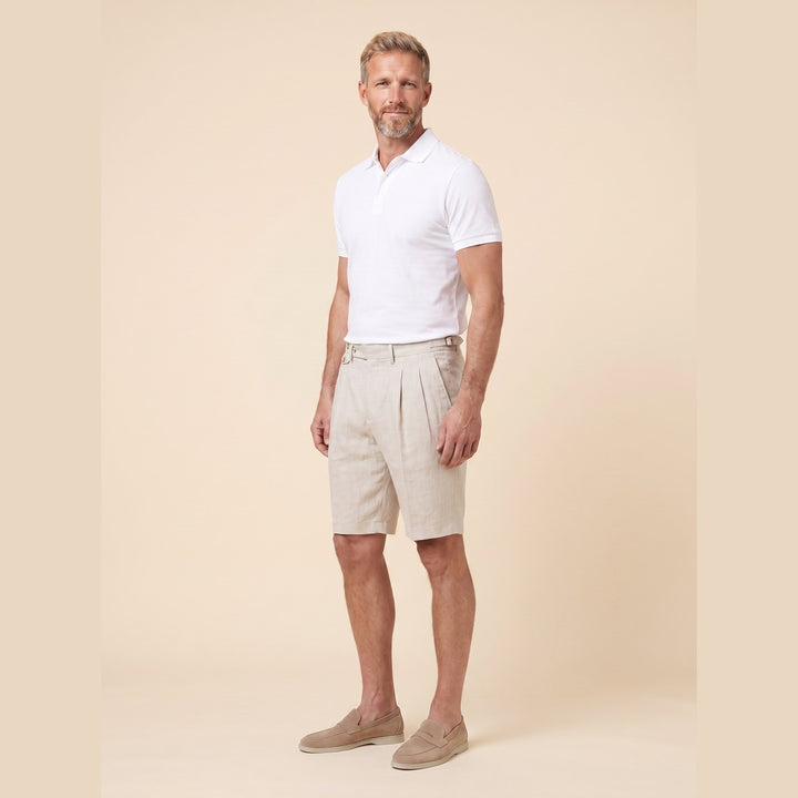 Brenlin linen Bermuda shorts, side view on model